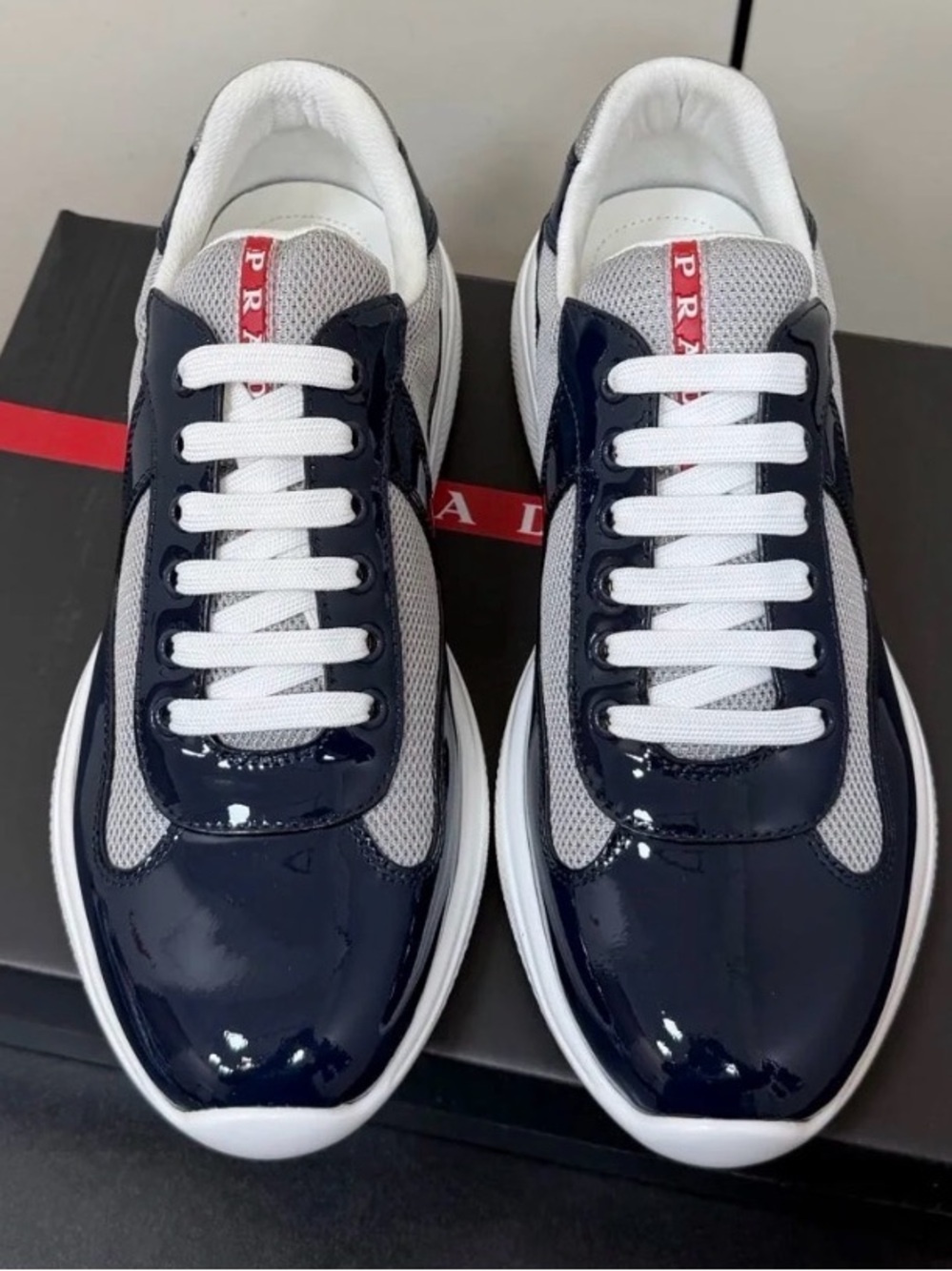 Prada Men's Navy and White Lace-Up Sneakers size 38 men’s size 5.5 women’s 8